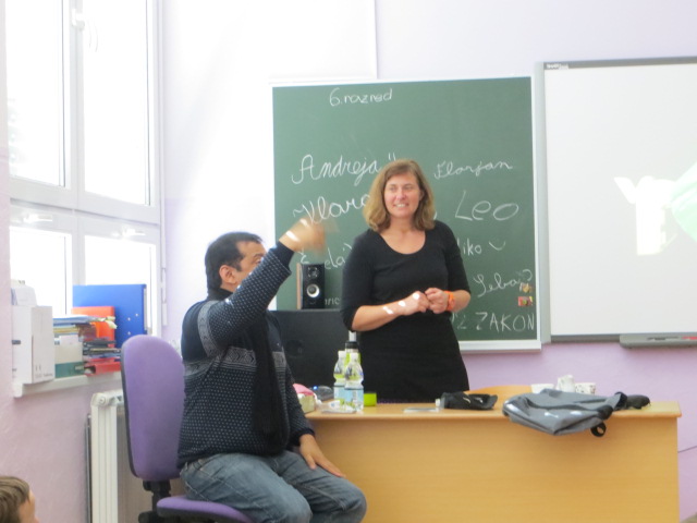 Deepak Thimaya asking a question during a classroom session